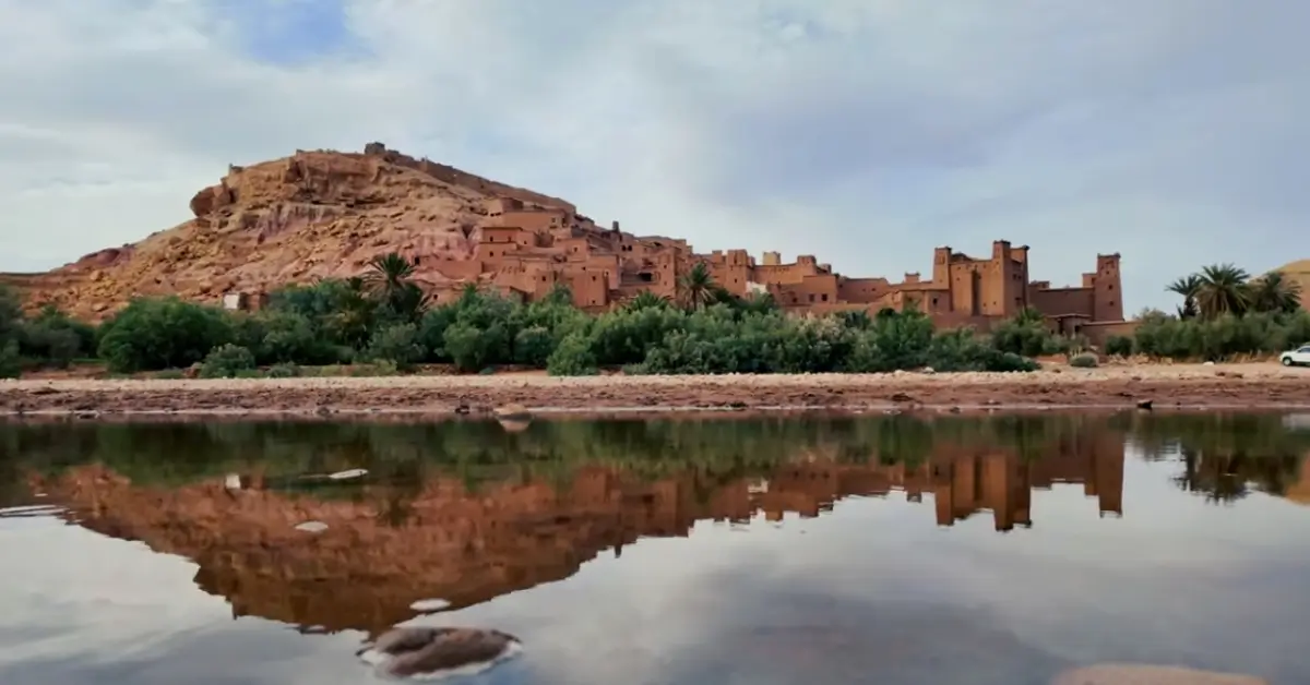 Ait Ben Haddou ksar reflected in the still waters of the Ounila River
