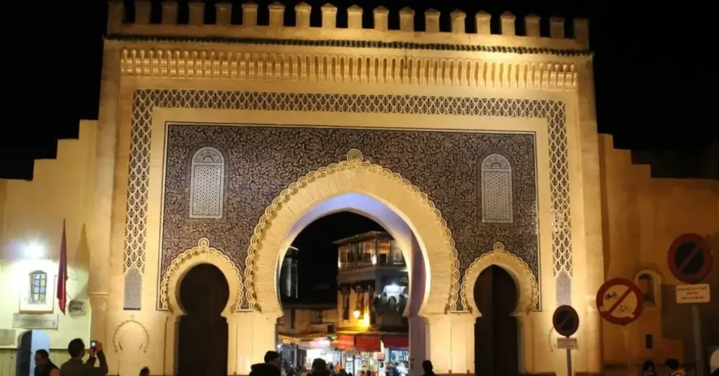 Blue Gate (Bab Boujloud) of Fez illuminated at night best morocco tours