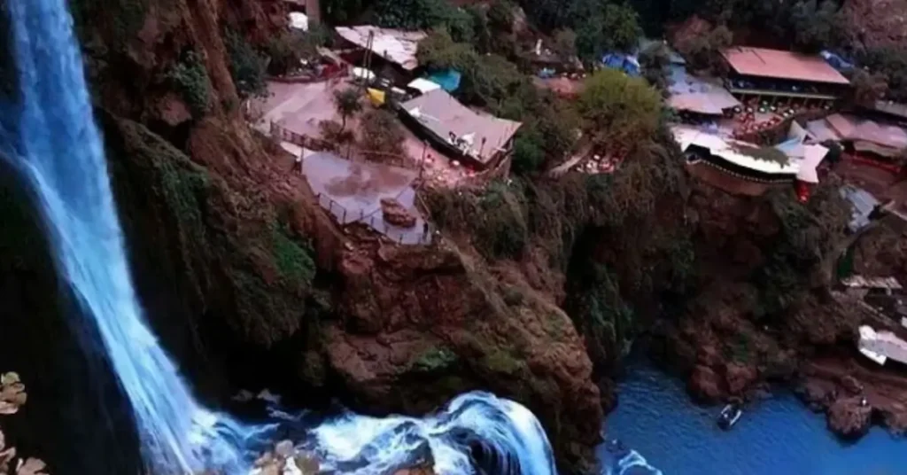 Panoramic view of Ouzoud Waterfalls surrounded by Berber cafés and cliffs