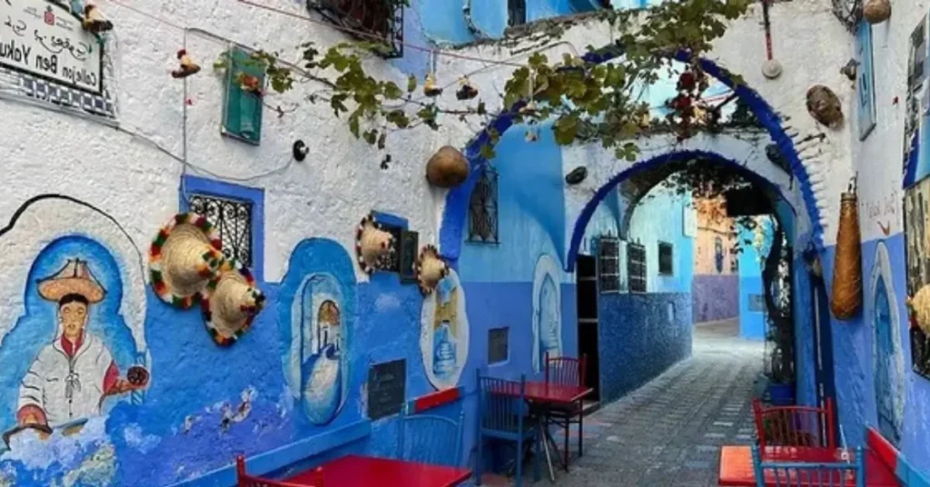 colorful chefchaouen alley during morocco travel tours