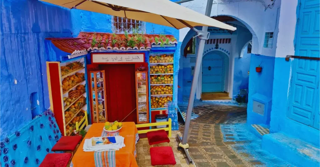 Colorful street in Chefchaouen Medina showcasing Moroccan identity and everyday life.is morocco a country