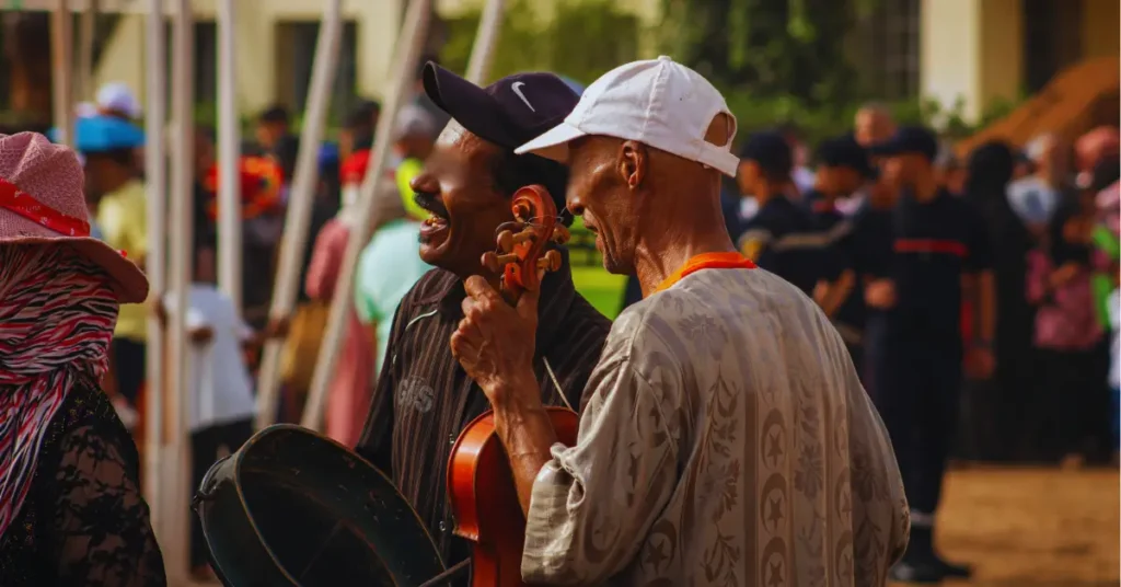 Moroccan musicians playing traditional instruments at a local celebration.is morocco a country